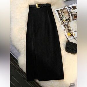 Corduroy midi black skirt with slit and belt